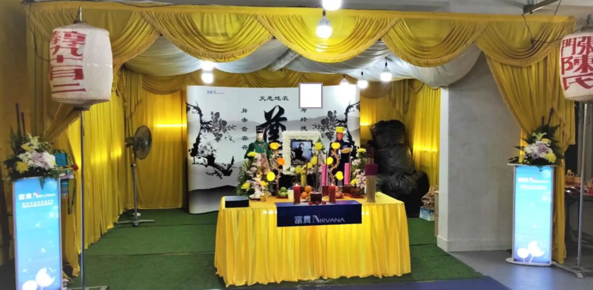 taoist funeral parlour with white and gold accents